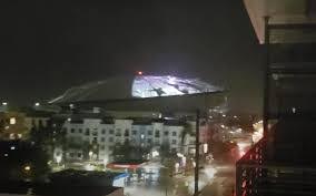 Picture of Tropicana Stadium, home of the Tampa Bay Rays, with part of its dome destroyed
